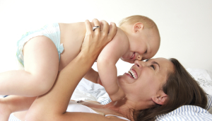 Mom playing with baby